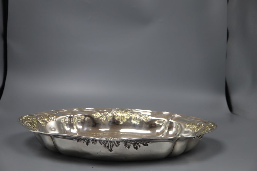 A George V parcel gilt silver shaped oval presentation bowl, Harman & Co, London, 1924, 40.3cm, 27oz.